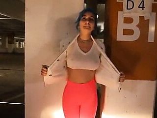 Showing her big tits in mall