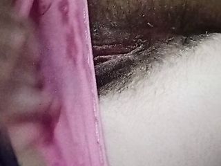  video: Tease in pink panties, hairy pussy lips.