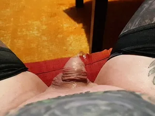 Close-up of my tiny cock pissing on the sofa