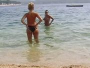 Two sexy chicks from Germany pleasing a hard cock outdoors