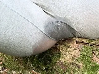 Pissing in pants outdoors