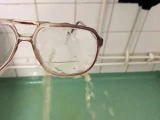 Grandpas glasses piss soaked and coated...