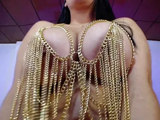 Sexy goddess plays in chains outfit...