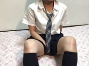A cute woman in school uniform masturbates alone while sweating under her armpits.