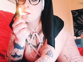  video: Nun gets horny smoking a cigar