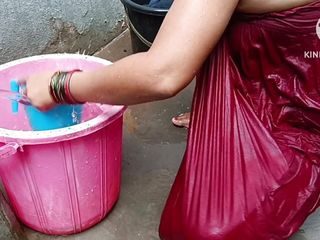 Indian housewife bathing with 