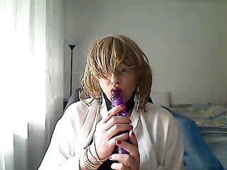 Horny Milfhorny Milf Tranny In Front Of Webcam Simulates A Blowjob While Playing With A Vibrator In Her Mouth