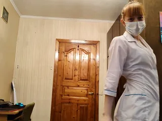 Anxious Nurse Treating A Sick Person