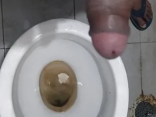 A guys masturbate penis bathroom...