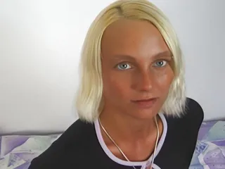 Petite Blonde With A Dildo In Her Ass Sucks Her Boyfriend's Cock Greedily