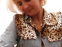 A slim blonde lady from Germany loves stuffing her fingers in her muff