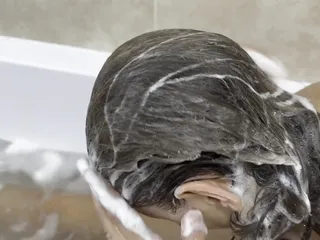 Hair washing in the bath