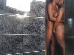 Having sex under the shower with the girl with the big ass