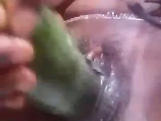 Stretching my pussy with a cucumber
