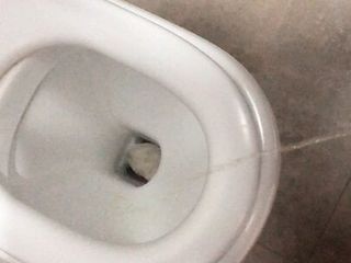 Pissing in a public bathroom...