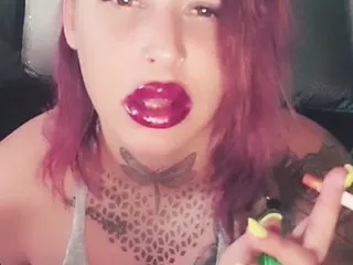 Painted Lips Smoking video: Perfectly painted lips smoking fetish to get you craving me!