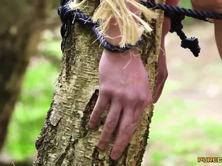 Guy Tied To Tree Gets Sucked Off By Three Babes