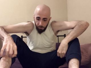 Bald Blue-Eyed White Guy With Uncut Dick Strips Down On The Bed To Reveal Very Hairy Skinny Body