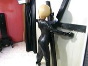 BDSM hardcore latex suit with funnel head