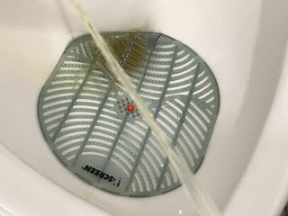Pissing staff toilet...