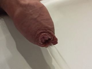Pissing in a public toilet sink...