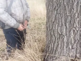 Pissed Under A Tree. Lots Of Piss From Big Cock