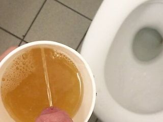 Pissing in a cup...