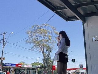 Asian Crossdresser Wearing Stockings At Bus Stop