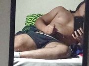 hot young man masturbates recording himself in front of the mirror