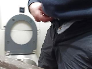 Pissing in a public toilet on...