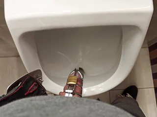 Pissing in public toilette 